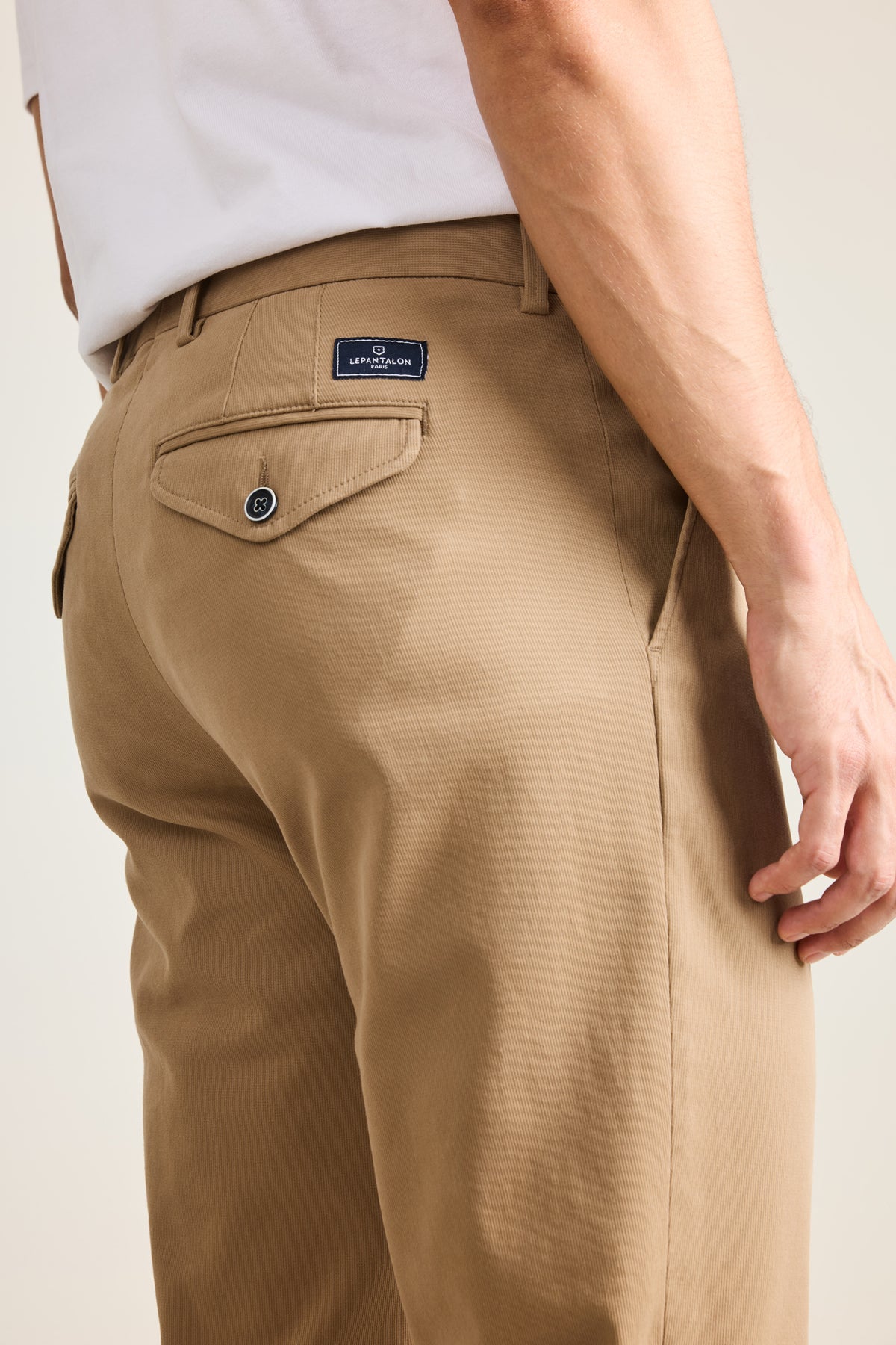 Beige pleated chinos