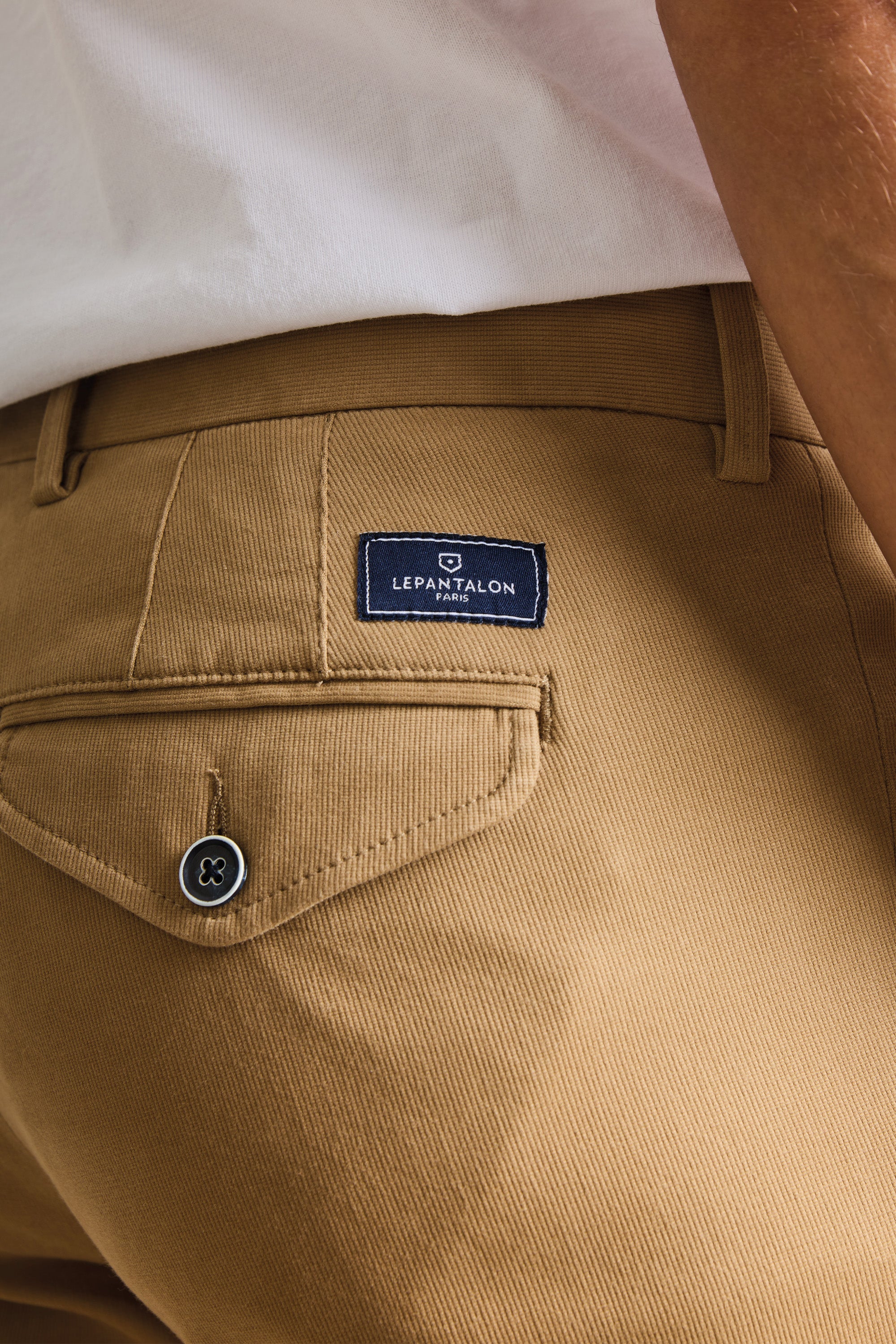 Beige pleated chinos