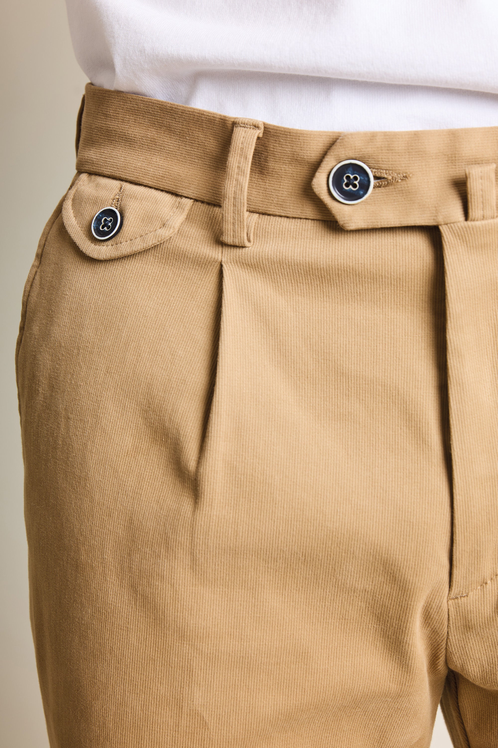 Beige pleated chinos
