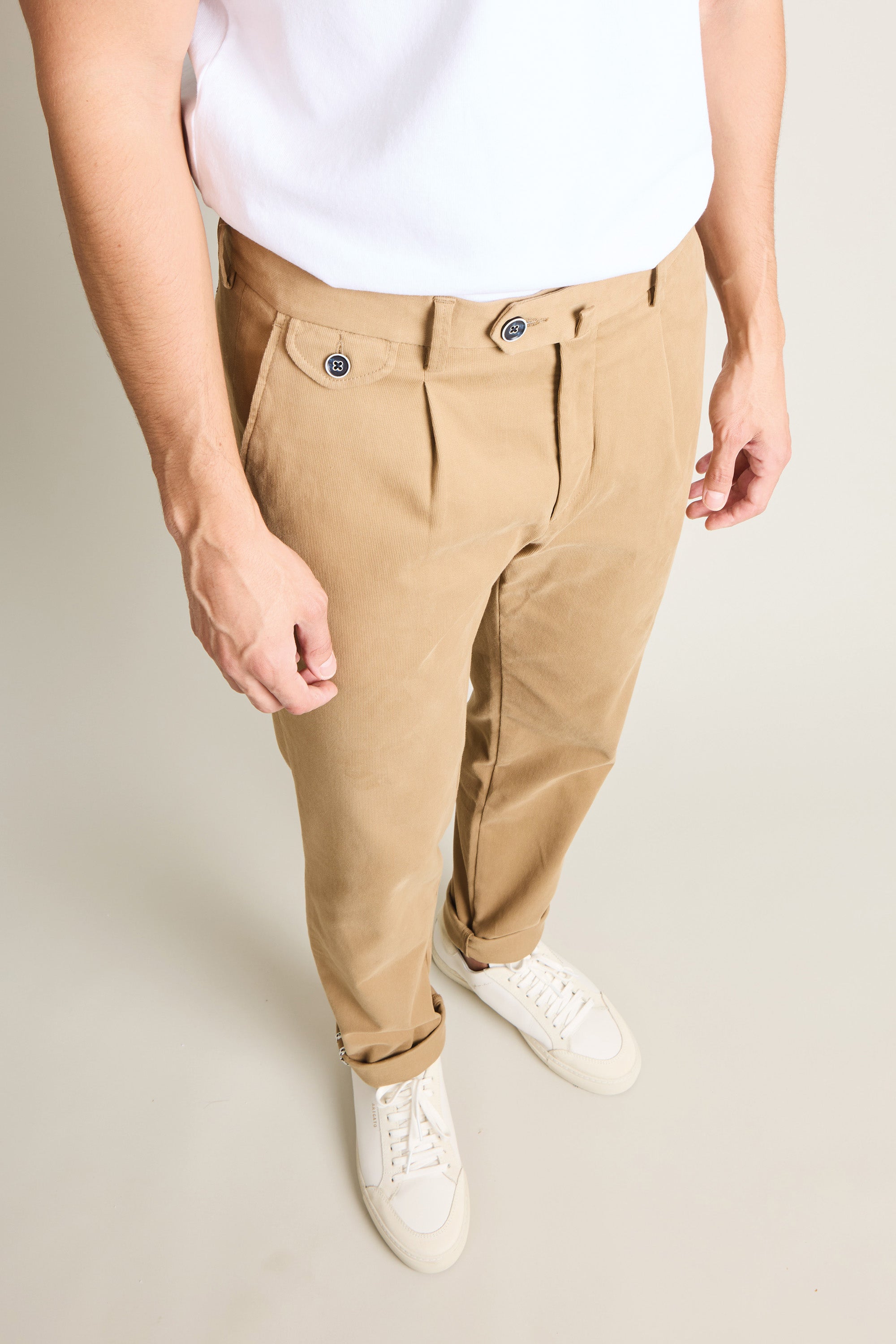 Beige pleated chinos