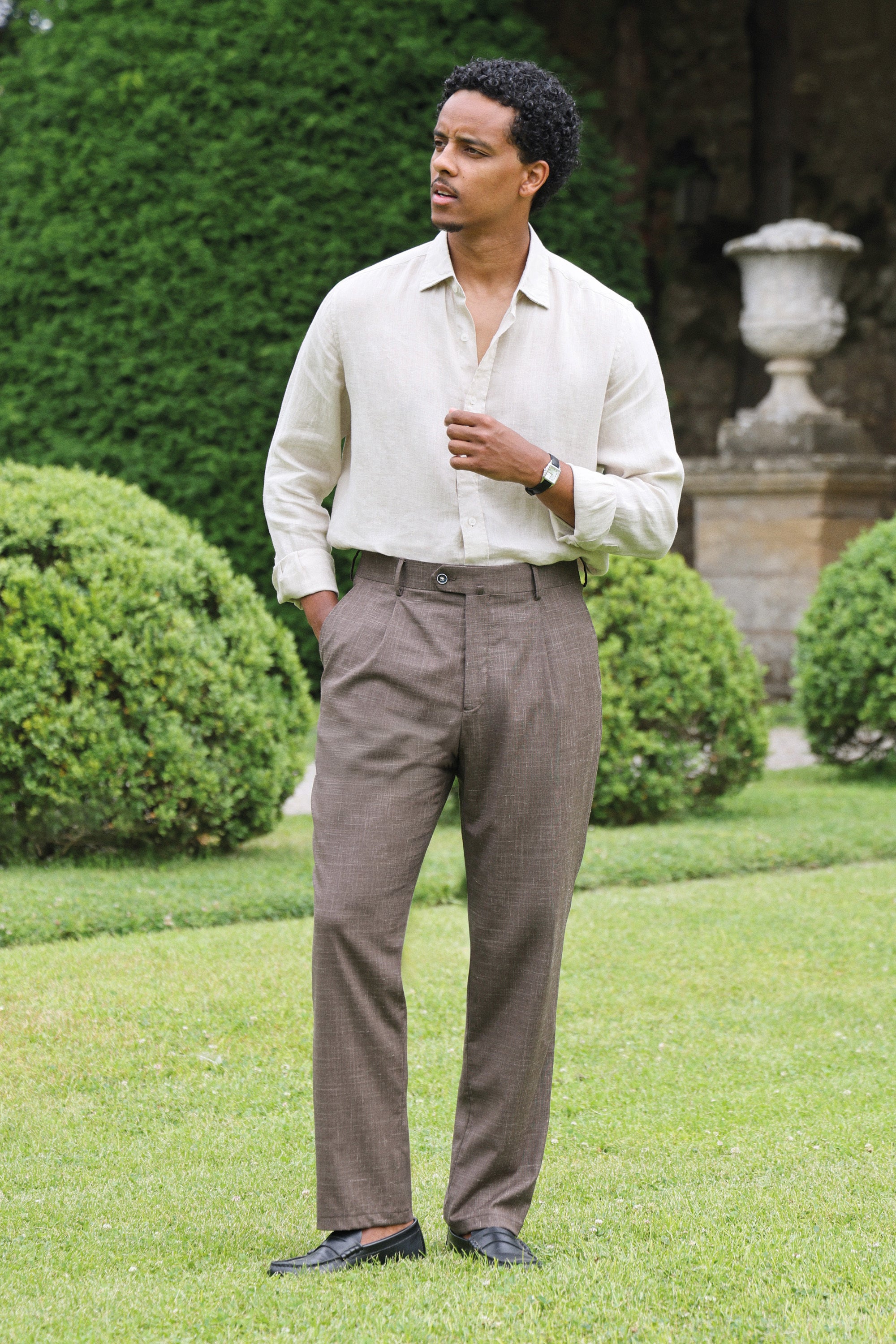 Lightweight brown pleated trousers