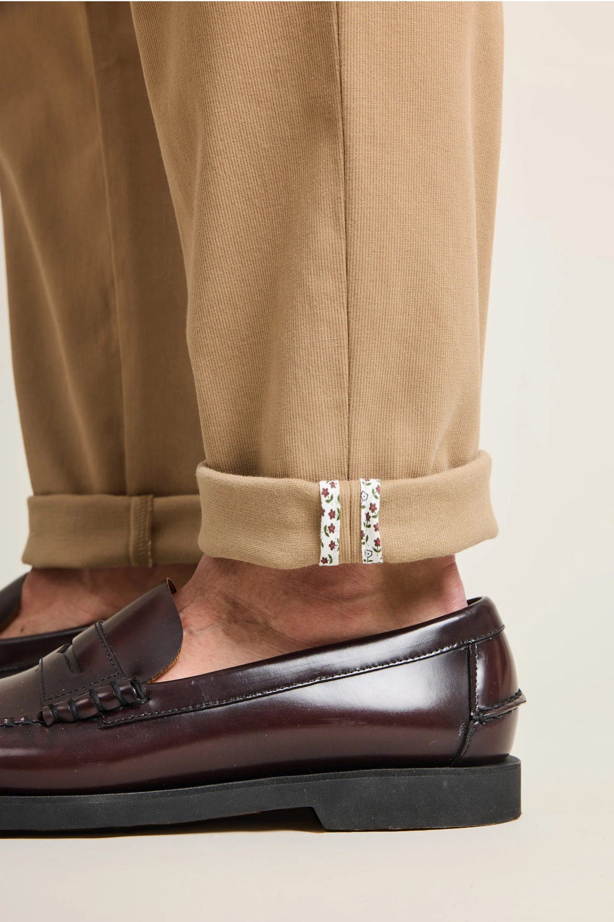 Beige pleated chinos