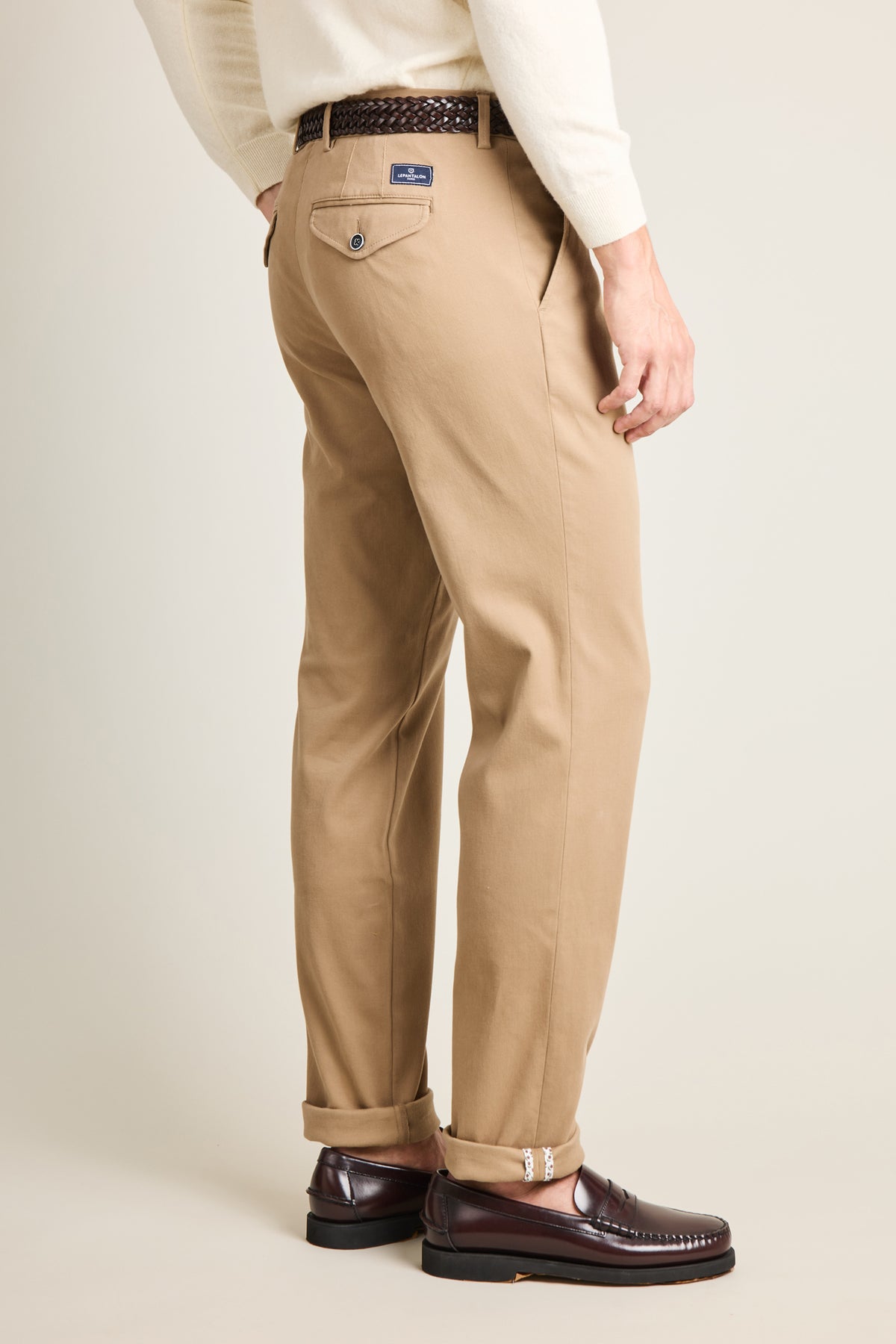 Beige pleated chinos