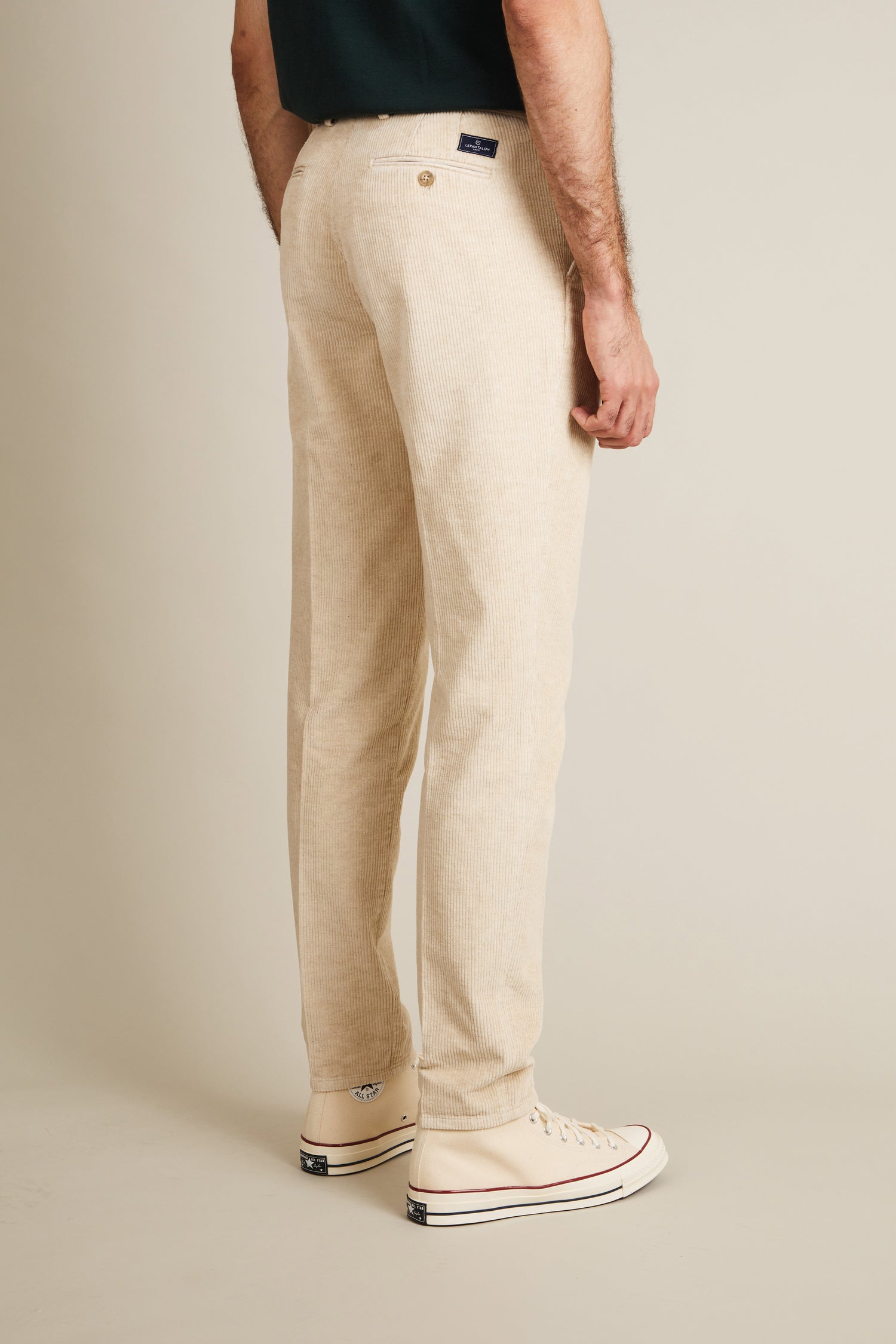 Ecru velvet pleated chinos