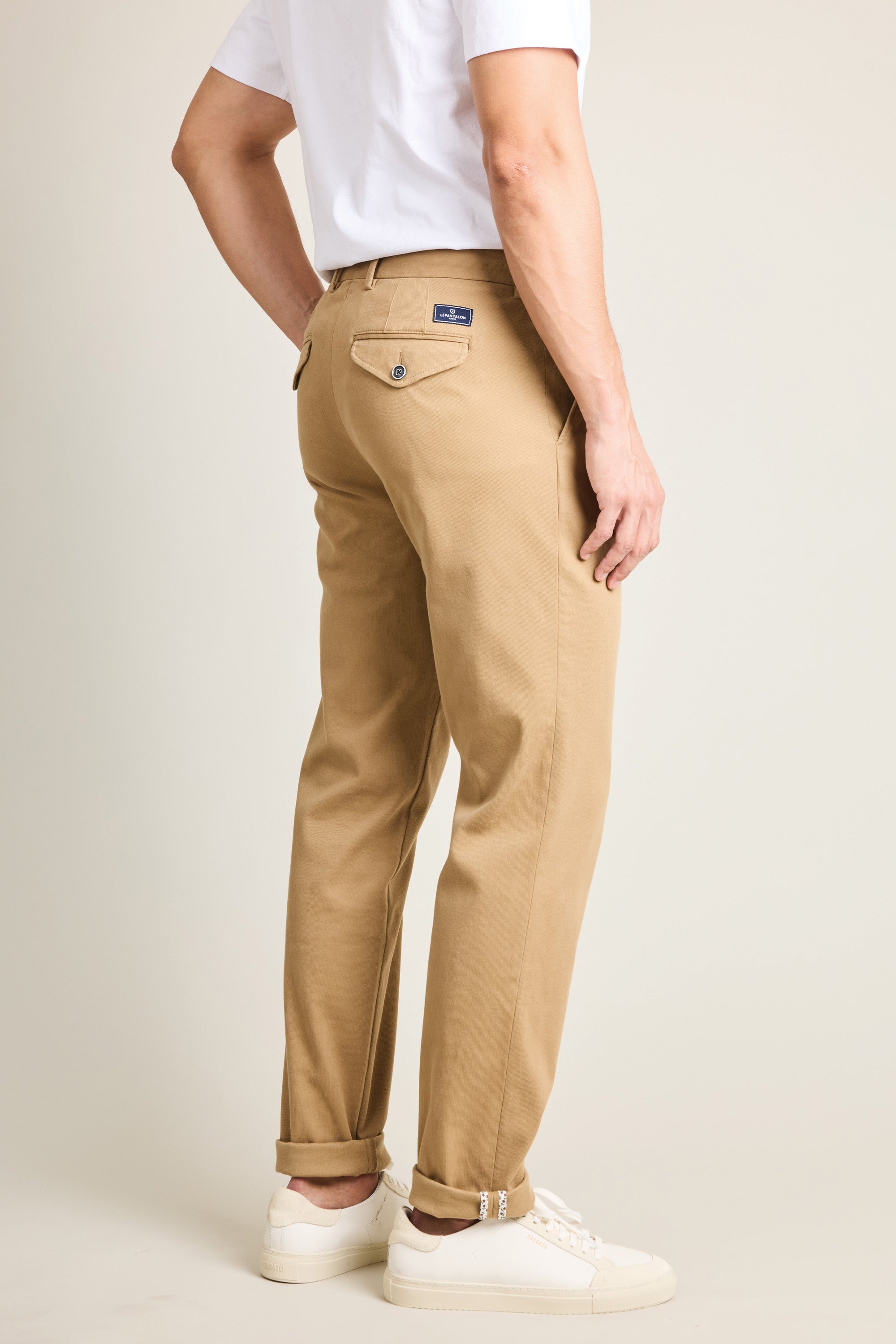 Beige pleated chinos