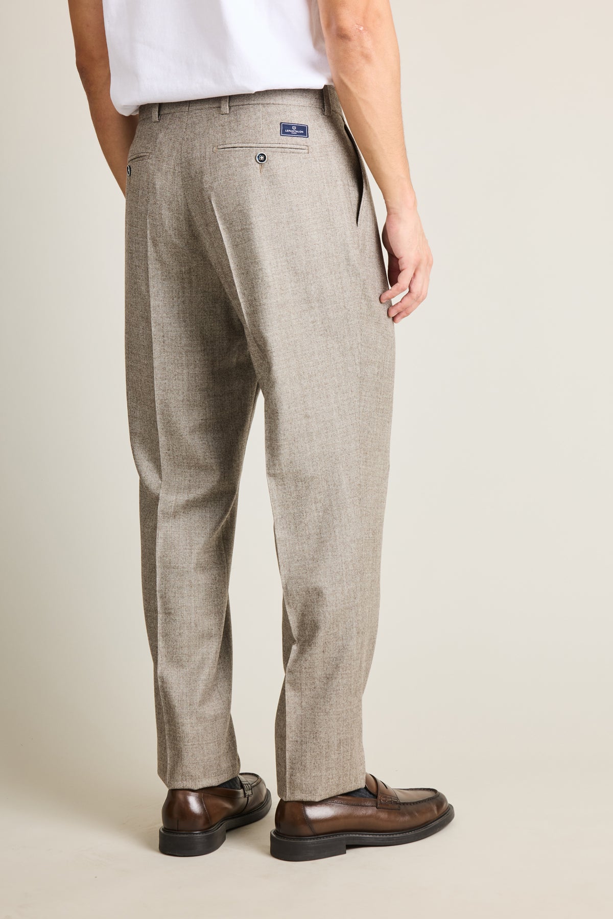 Beige pleated pants