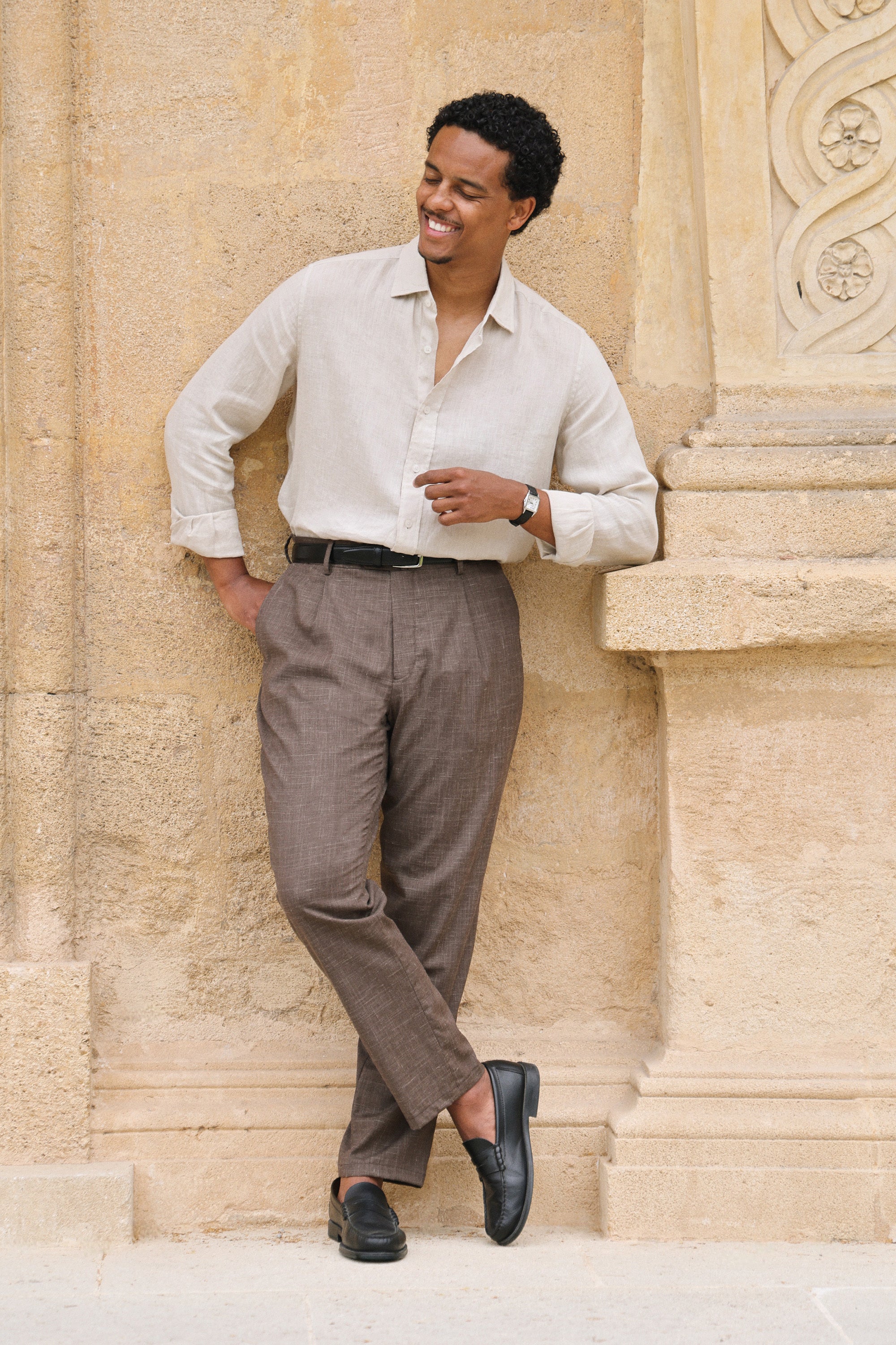 Lightweight brown pleated trousers