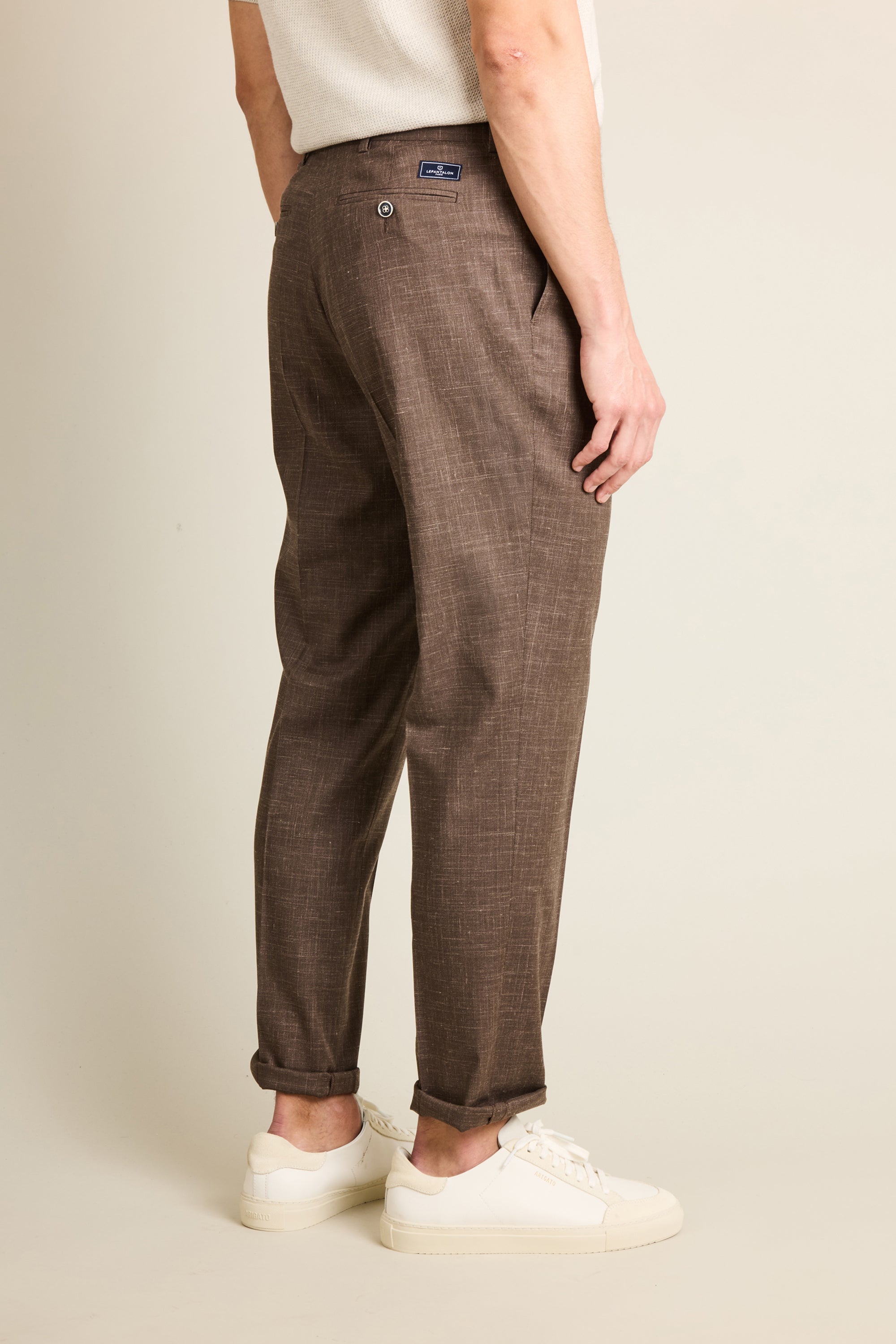 Lightweight brown pleated trousers